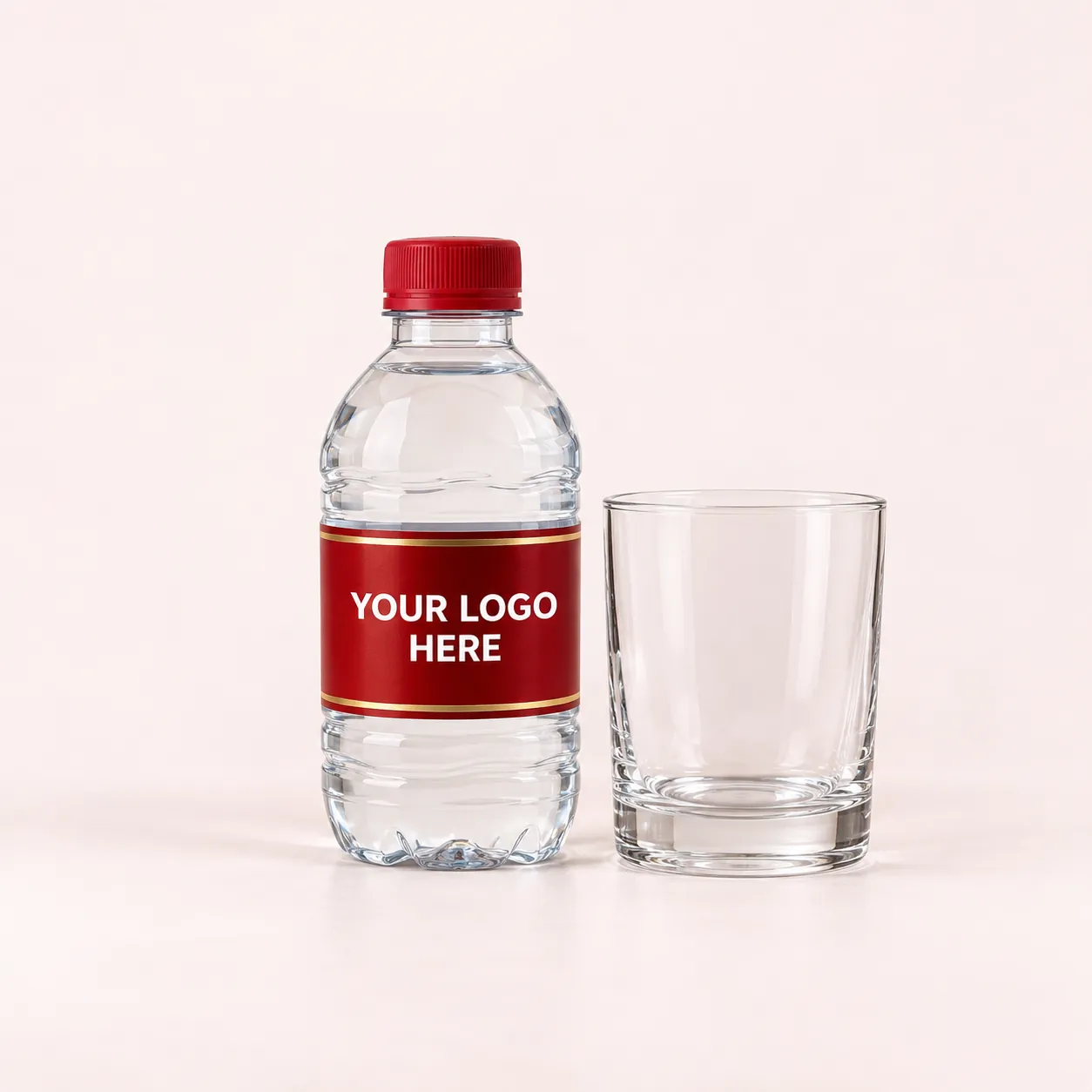 300 ml custom label water bottle next to a drinking glass for scale